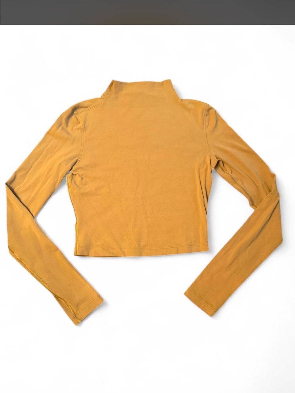 Lululemon Mock Neck Cropped Long-Sleeve Top in Mustard Yellow